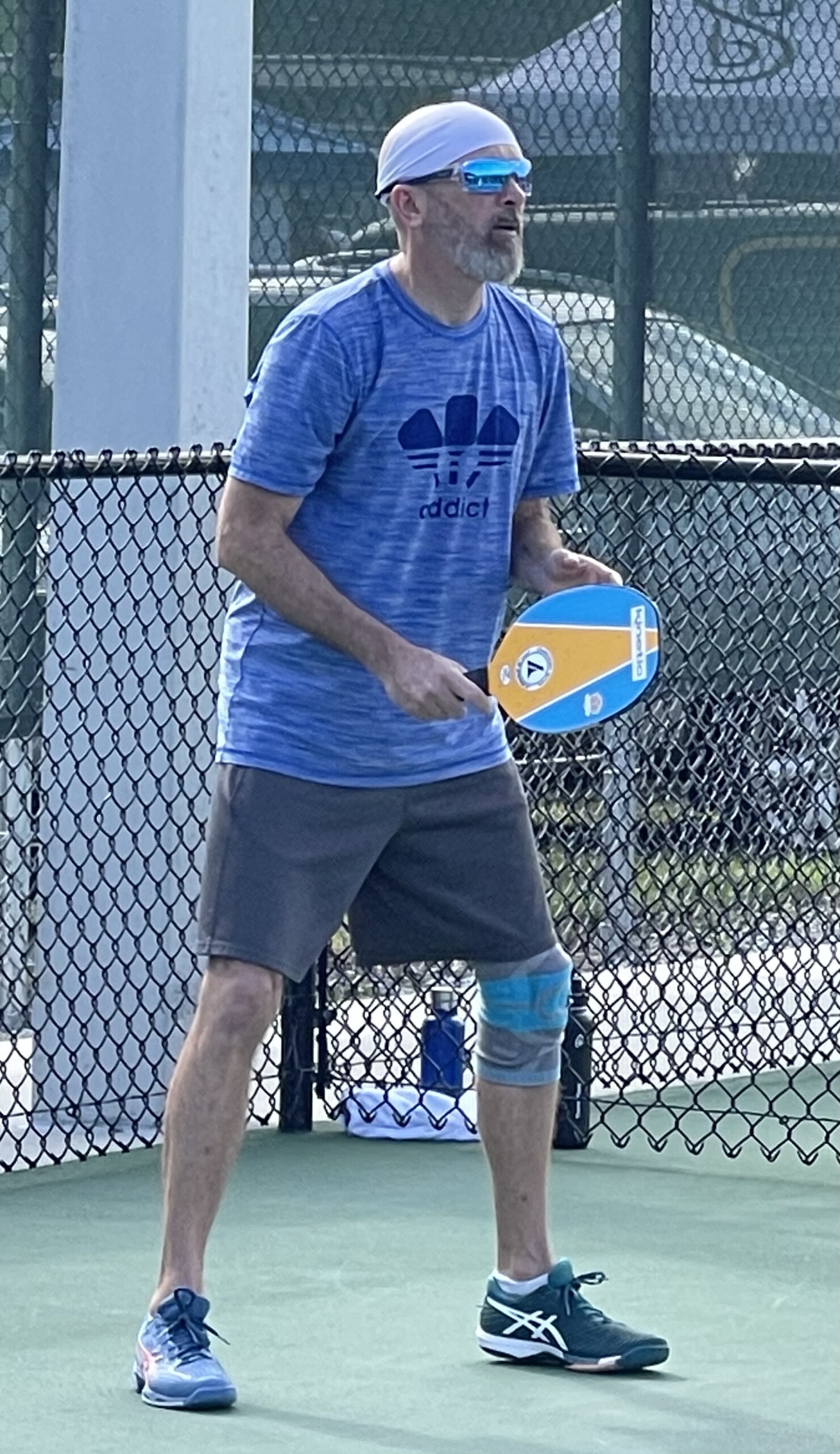 Mojo Playing in a Pickleball Tournament